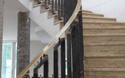Curved Marble and Brass Staircase